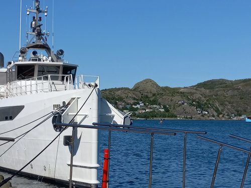 A beautiful private yacht moored in St. John's harbor.