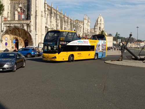 Hop On Hop Off bus arriving to pick us up at one of their stops in Lisbon for our extended tour.