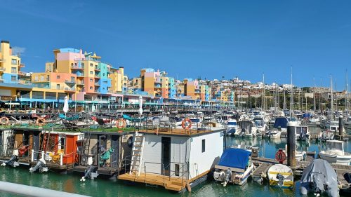 The Albufeira Marina in the foreground, seasonal rentals at the back.